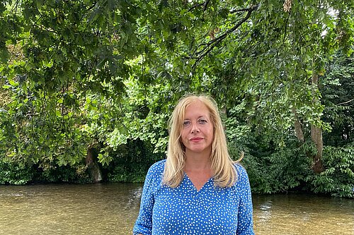 Liz near a river