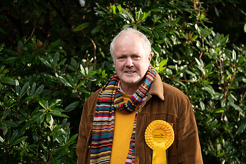 Clive Jones outside wearing a scarf